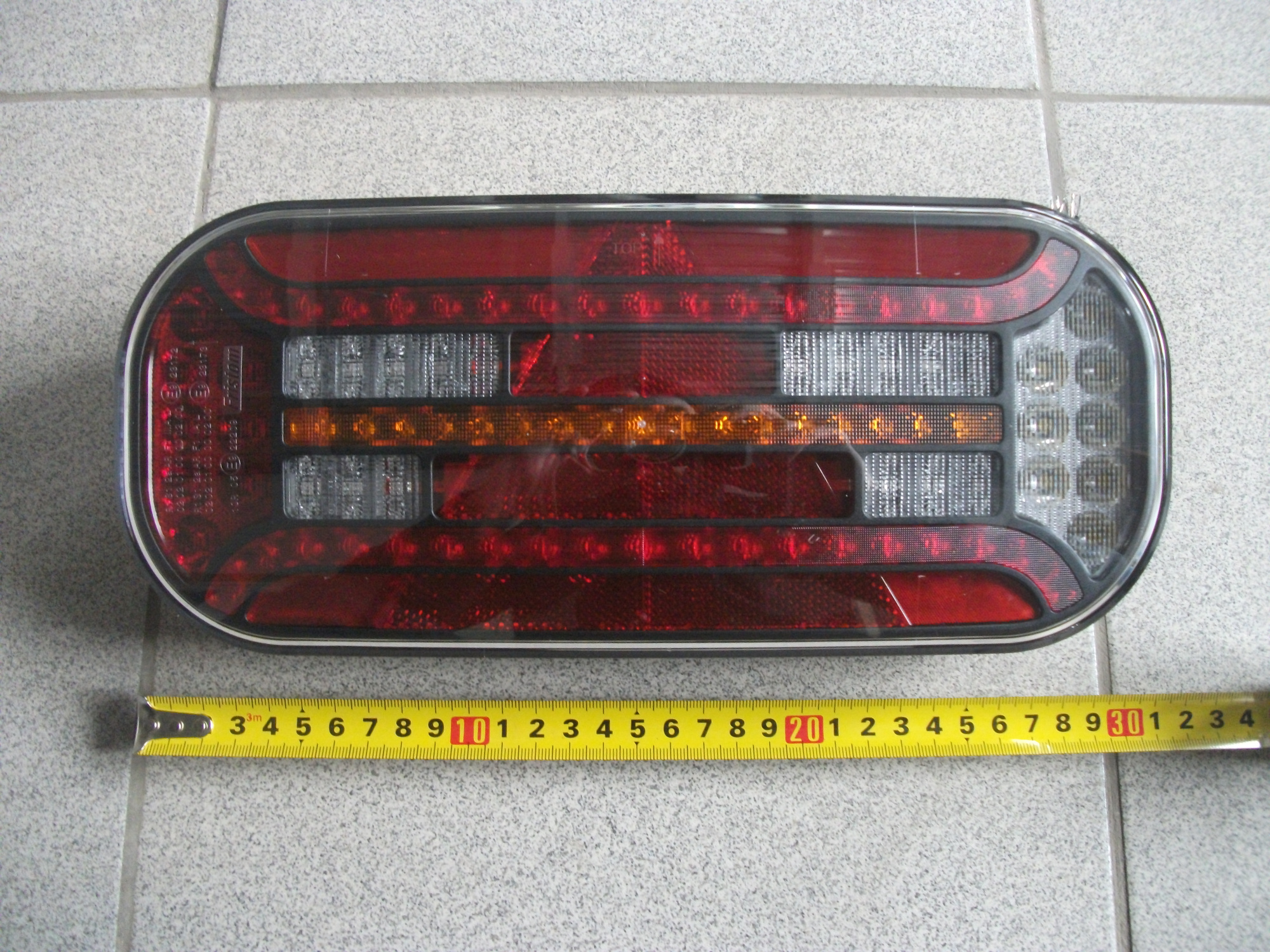 Фонарь задний  LED универсальный 12V/24V с треугольником ПРАВЫЙ без осв.ном.зн. FRISTOM  FT610PLEDDI